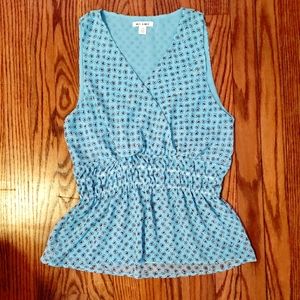 Light blue, floral, sleeveless blouse